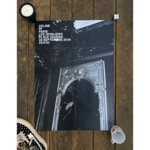 Official double-sided CELINE SS19 show invitation art poster by Hedi Slimane, featuring a black-and-white image of graffiti-covered Parisian nightclub walls on one side, and an ornate interior archway on the reverse, with show details printed in white, measuring 72x56.5cm.