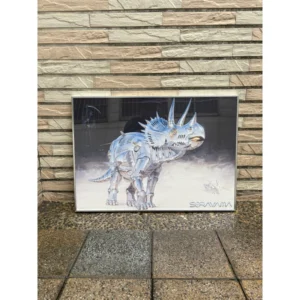 Framed official Hajime Sorayama artwork poster featuring a metallic Mechanical Triceratops dinosaur with reflective chrome shading in a sleek aluminum frame.