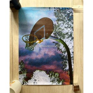 Official 2022 Slam Jam x Nike Air Force 1 promotional poster photographed by Julian Klincewicz featuring a grainy high-contrast analogue shot of an outdoor basketball hoop against dramatic sky and trees.