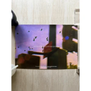 Official 2022 Slam Jam x Nike Air Force 1 horizontal promotional poster photographed by Julian Klincewicz featuring a grainy cinematic shot in purple tones of traffic lights and birds in flight over city streets.