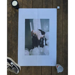 Official double-sided TOGA S/S 2023 fashion poster shot by Mina Ahn, featuring a side profile of a woman leaping near balloons in a black voluminous skirt on Side A, and an arching back composition among white balloons on Side B, measuring 80.5x53cm.